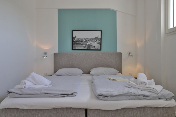 Ohlerich Speicher App. 03 - Blick in das Schlafzimmer mit einem Boxspringbett