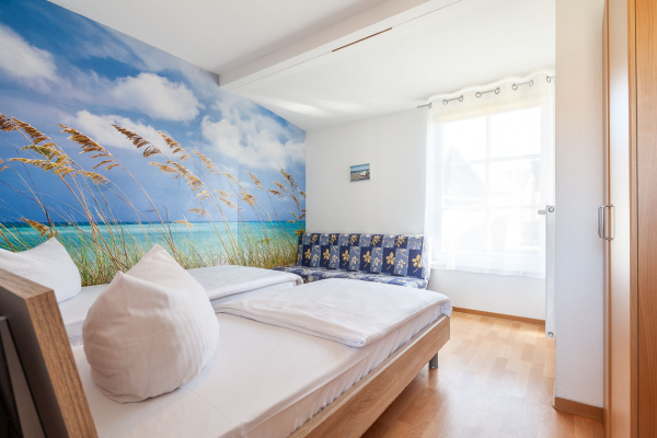 Mariannenweg 7 - Blick in das Schlafzimmer mit zwei Einzelbetten