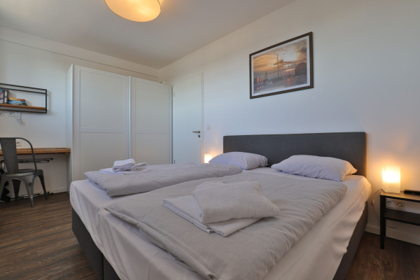 Ohlerich Speicher App. 31 - Blick in das Schlafzimmer mit einem Boxspringbett