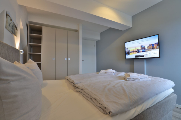 Ohlerich Speicher App.45 - kleiner Schlafbereich mit Doppelbett und TV