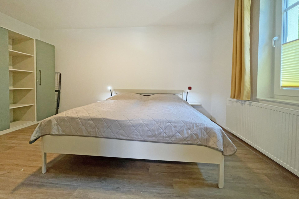 Waldfrieden Whg. 5 - Blick in das Schlafzimmer mit einem Doppelbett