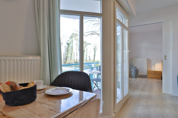 Haus am Meer, Whg.2 - Blick vom Essbereich ins Schlafzimmer