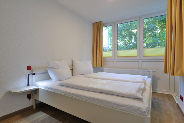 Waldfrieden Whg. 4 - Blick in das Schlafzimmer mit einem Doppelbett