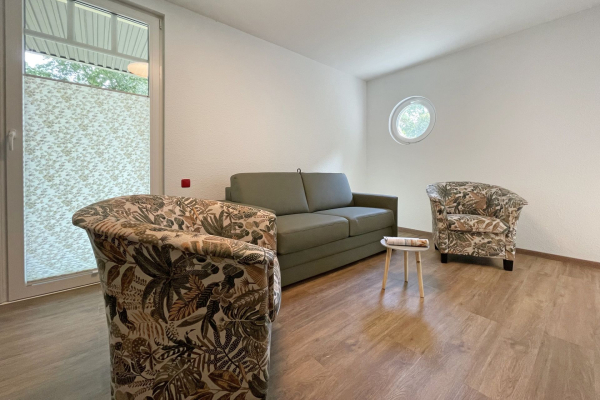 Waldfrieden Whg. 3 - Blick auf den offenen Wohnbereich mit Schlafsofa