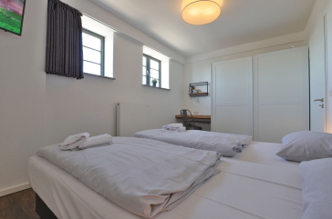 Ohlerich Speicher App. 31 - Blick in das Schlafzimmer mit einem Boxspringbett