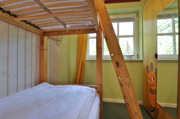 Landhaus Uhlenbusch - Blick in ein Schlafzimmer mit Etagenbett im EG