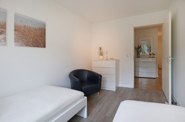 Seeschwalbe Whg. 2 - Blick in das Schlafzimmer mit zwei Einzelbetten