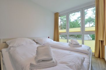 Waldfrieden Whg. 3 - Blick in das Schlafzimmer mit einem Doppelbett