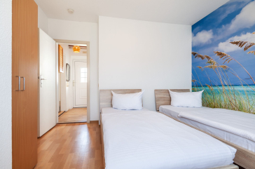Mariannenweg 7 - Blick in das Schlafzimmer mit zwei Einzelbetten