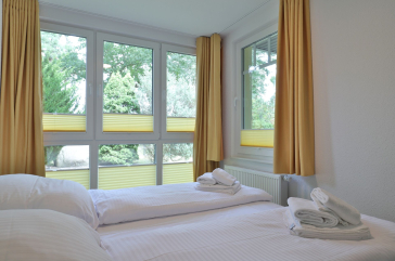 Waldfrieden Whg. 3 - Blick in das Schlafzimmer mit einem Doppelbett