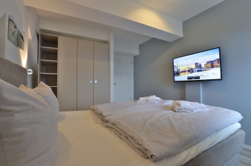 Ohlerich Speicher App.45 - kleiner Schlafbereich mit Doppelbett und TV