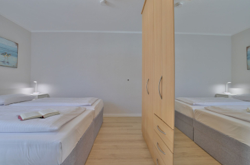 Haus am Meer, Whg.06 - Blick in das Schlafzimmer mit einem schönen Doppelbett