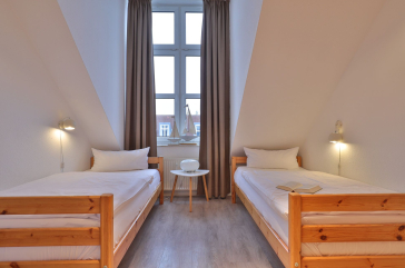 Sünnslag App.13/59 - Blick in das Kinder-/ Gästezimmer mit 2 Einzelbetten