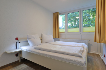 Waldfrieden Whg. 4 - Blick in das Schlafzimmer mit einem Doppelbett