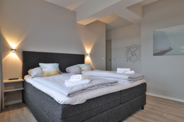 Ohlerich Speicher App.47 - Blick in das kleine Schlafzimmer mit Boxspringbett