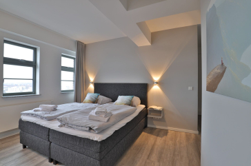 Ohlerich Speicher App.47 - Blick in das kleine Schlafzimmer mit Boxspringbett