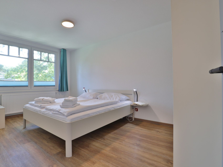 Waldfrieden Whg.6 - Blick in das Schlafzimmer mit einem Doppelbett