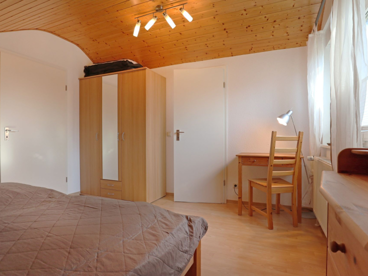 Urlauberdorf 23a - Blick in das Schlafzimmer im OG