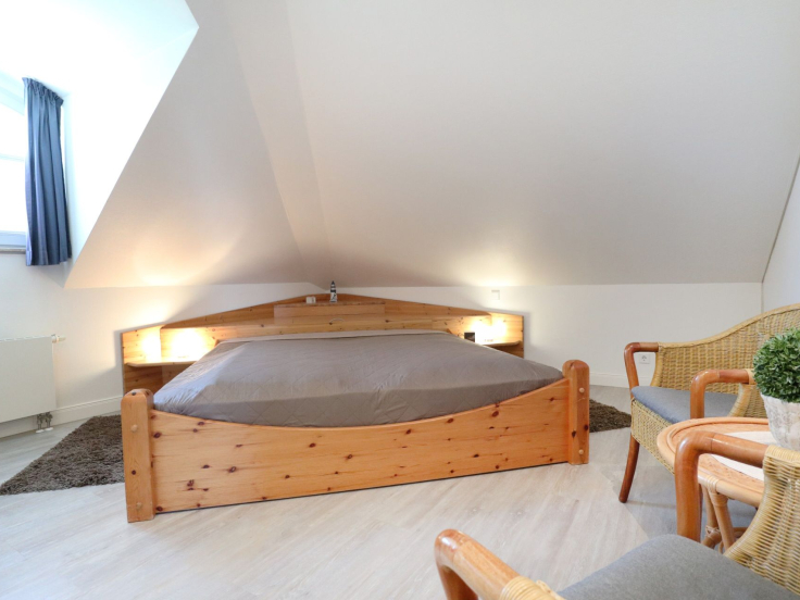 Villa Seegarten Whg. Seg11 - Blick in das Schlafzimmer mit einem Doppelbett