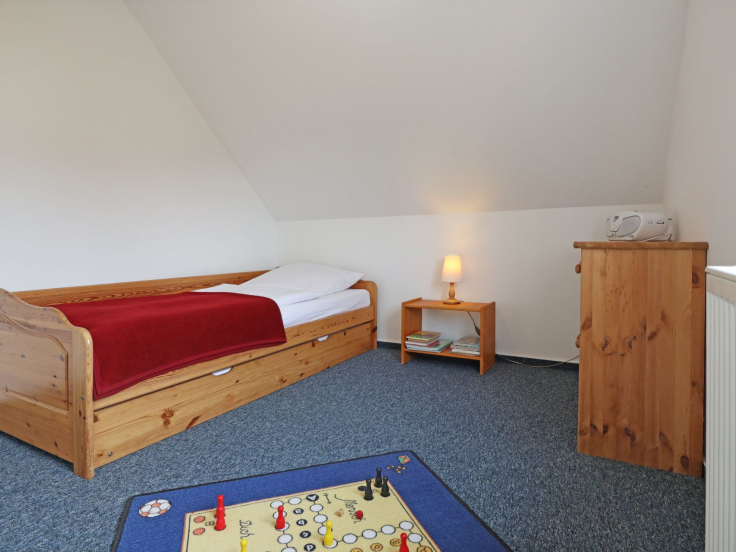 Löönboom - Blick in das Kinder-/ Gästezimmer mit einem Ausziehbett