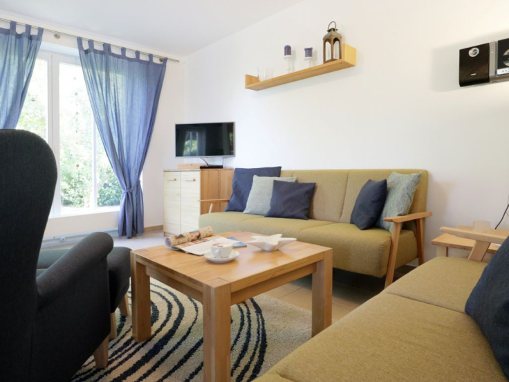 Löönboom - Blick auf den Wohnbereich mit 2 Sofas und einem Sessel