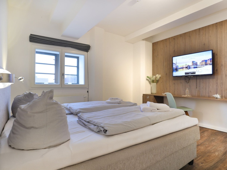 Ohlerich Speicher App. 04 - Blick in das Schlafzimmer mit einem 2.TV