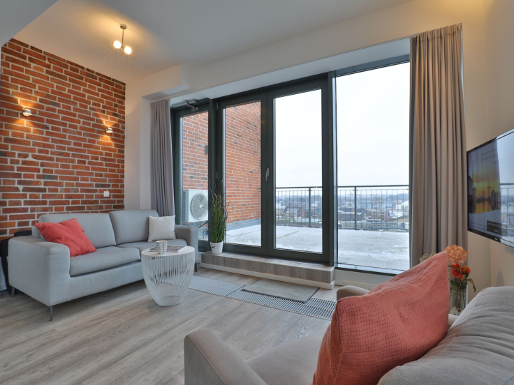 Ohlerich Speicher App.45 - offener Wohnbereich mit Terrassenzugang