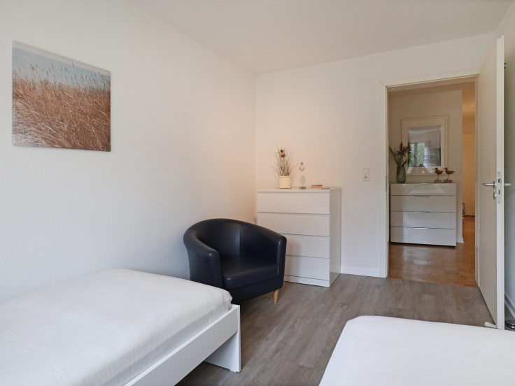 Seeschwalbe Whg. 2 - Blick in das Schlafzimmer mit zwei Einzelbetten