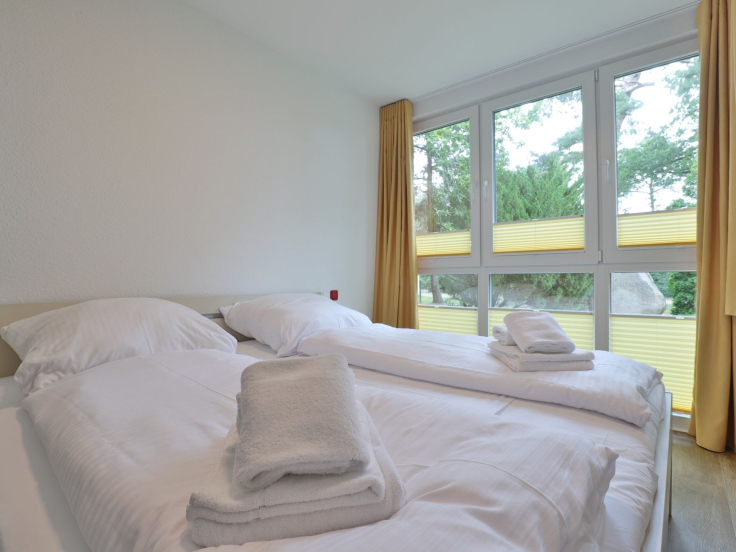 Waldfrieden Whg. 3 - Blick in das Schlafzimmer mit einem Doppelbett