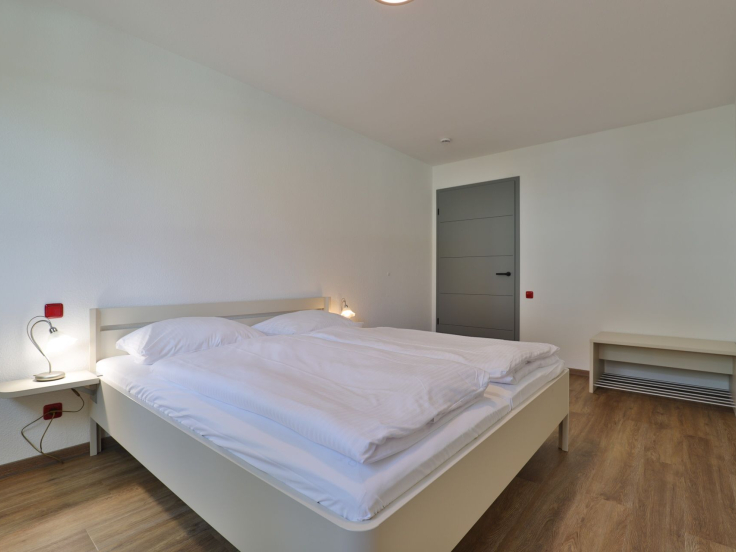 Waldfrieden Whg.2 - Blick in das Schlafzimmer mit einem großen Doppelbett