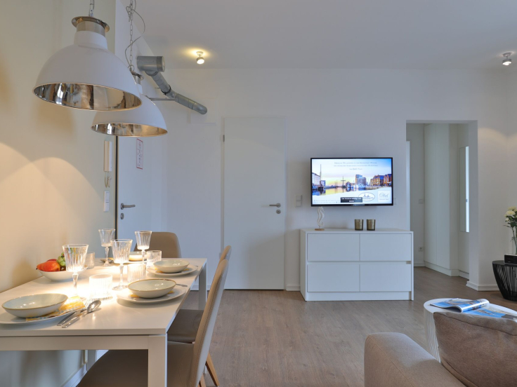 Ohlerich Speicher App. 33 - Blick auf den Wohn-/ Essbereich mit Fernseher