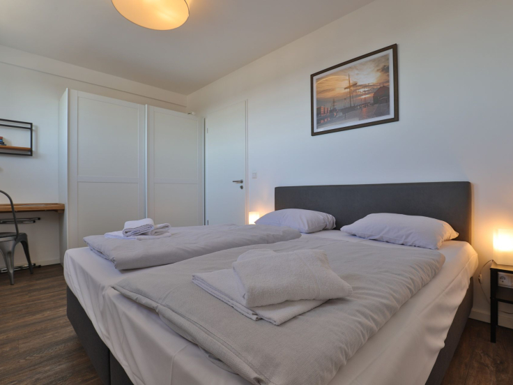 Ohlerich Speicher App. 31 - Blick in das Schlafzimmer mit einem Boxspringbett