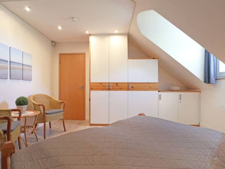 Villa Seegarten Whg. Seg11 - Blick in das Schlafzimmer mit einem Doppelbett