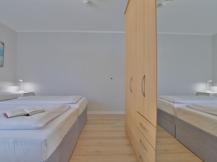 Haus am Meer, Whg.06 - Blick in das Schlafzimmer mit einem schönen Doppelbett