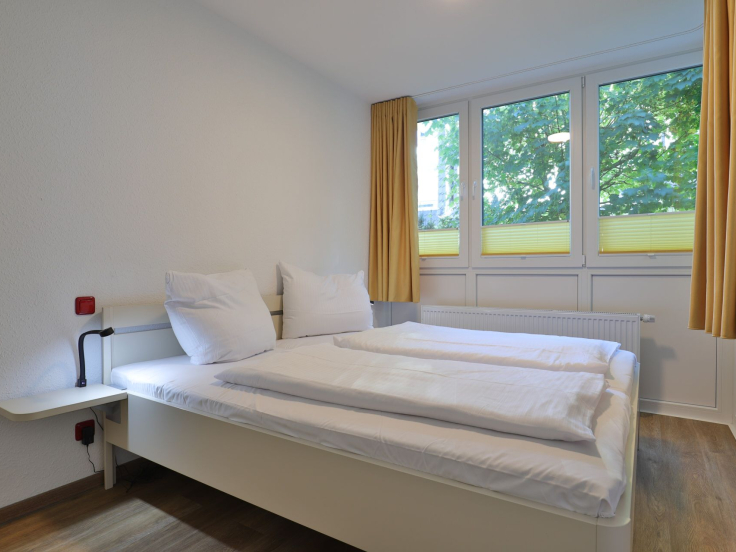 Waldfrieden Whg. 4 - Blick in das Schlafzimmer mit einem Doppelbett