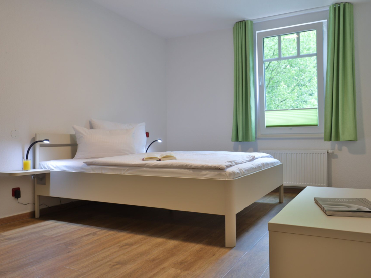 Waldfrieden Whg. 8 - Blick in das Schlafzimmer mit einem Doppelbett