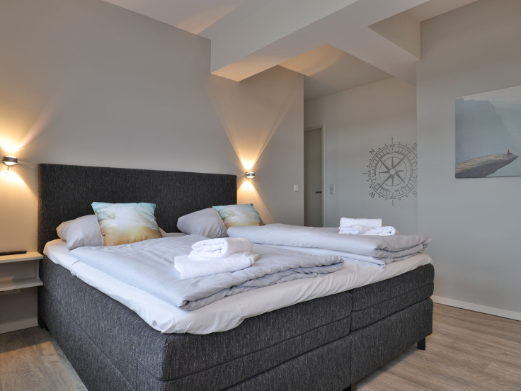 Ohlerich Speicher App.47 - Blick in das kleine Schlafzimmer mit Boxspringbett