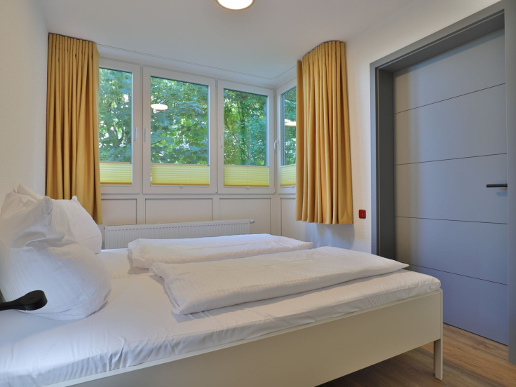 Waldfrieden Whg. 4 - Blick in das Schlafzimmer mit einem Doppelbett