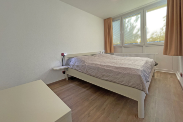 Waldfrieden Whg. 4 - Blick in das Schlafzimmer mit einem Doppelbett