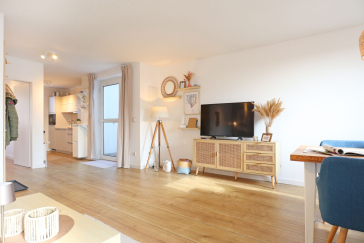 Sünnslag Whg. Sü4/108 - Blick vom Sofa auf den TV