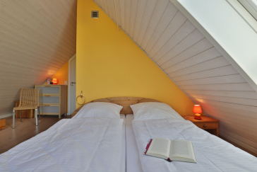 Landhaus Uhlenbusch - Blick in das Schlafzimmer im OG mit 3 Schlafplätzen