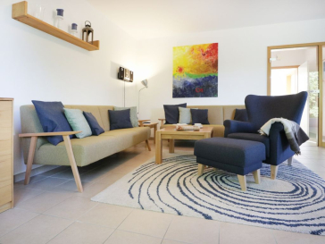 Löönboom - Blick auf den Wohnbereich mit 2 Sofas und einem Sessel