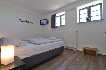 Ohlerich Speicher App. 31 - Blick in das Schlafzimmer mit einem Boxspringbett